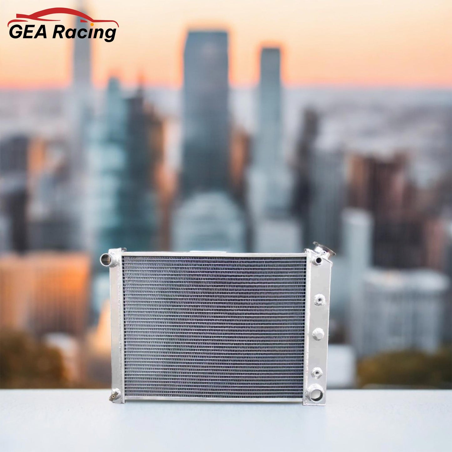 A 3 row aluminum radiator installed in the engine bay of a classic 1970s Chevrolet, showcasing a perfect fit and upgraded cooling performance.