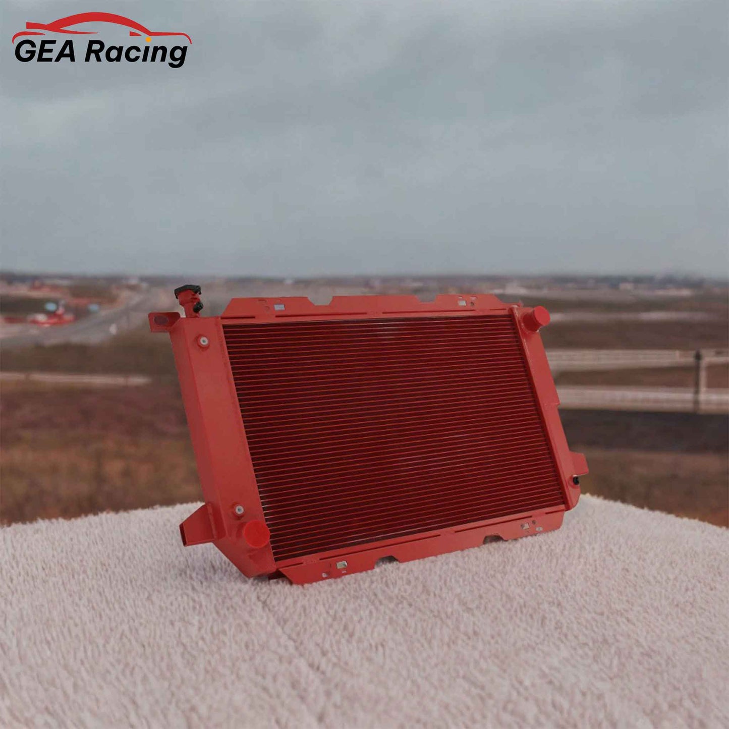 3 Row Red Aluminum Radiator for 1985-1997 Ford Bronco, F-150, F-250, F-350 5.8L V8, high-performance cooling system, front angled view display