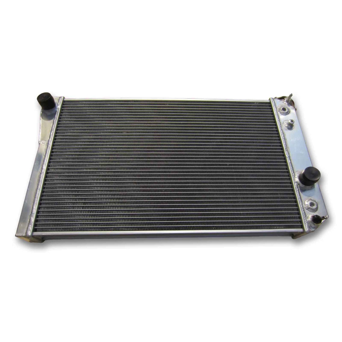 Top-down view of the 3-Row 52mm aluminum radiator for the Corvette C4, showing the filler neck, cap, and full core width.