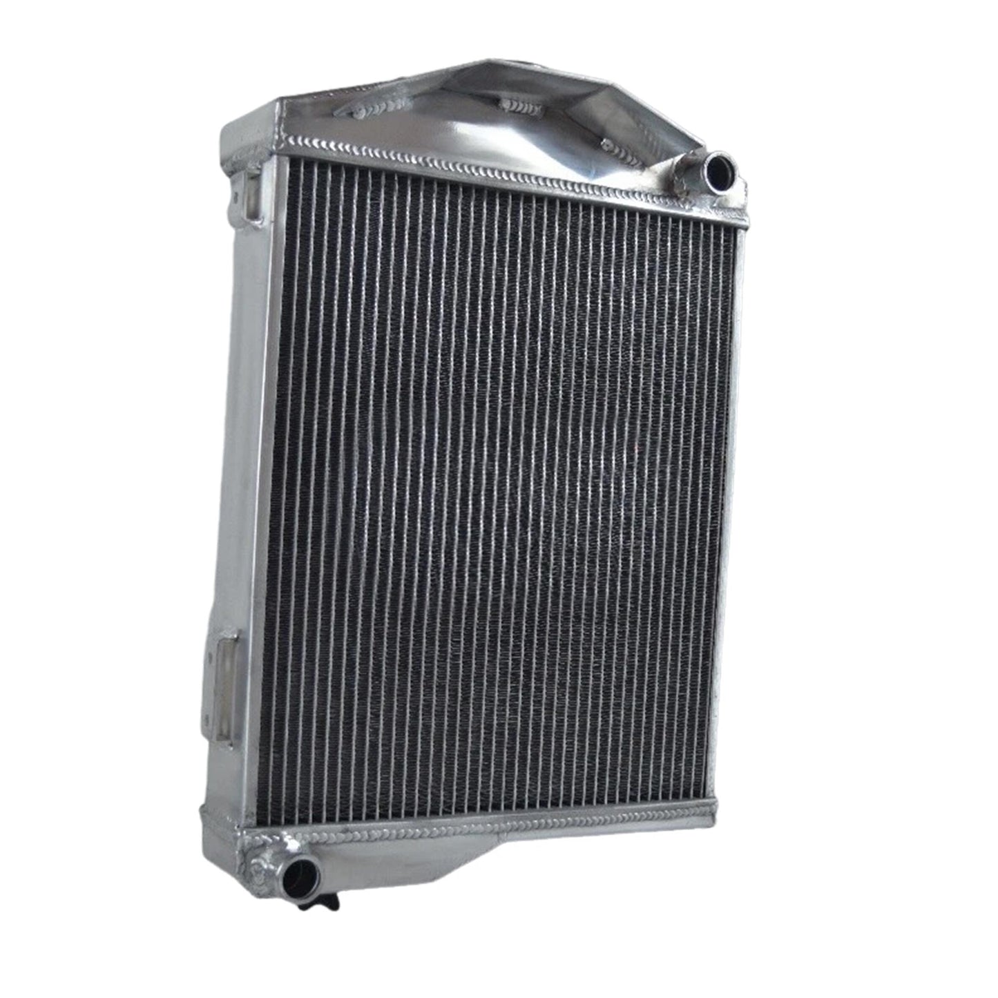 Right side profile of the aluminum radiator for a classic Austin-Healey, showing the polished finish and inlet/outlet port design.