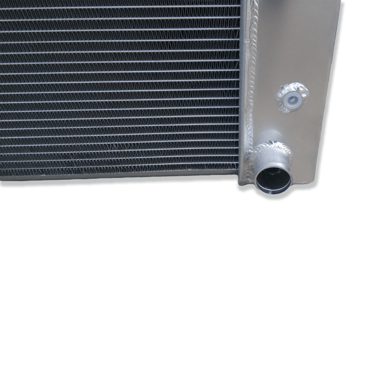 Close-up detail of the precision TIG welds on the aluminum radiator, built for the durability required by a classic Chevy C10 truck.