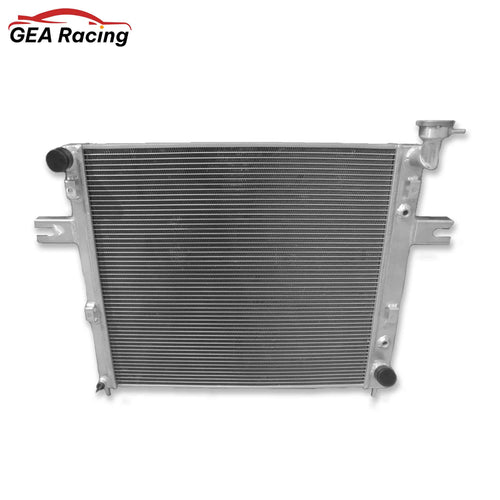 Front view of the full aluminum radiator for a 1999-2000 Jeep Grand Cherokee WJ/WG 4.7L V8, showing the high-efficiency cooling core and end tanks. Compatible with AT/MT.