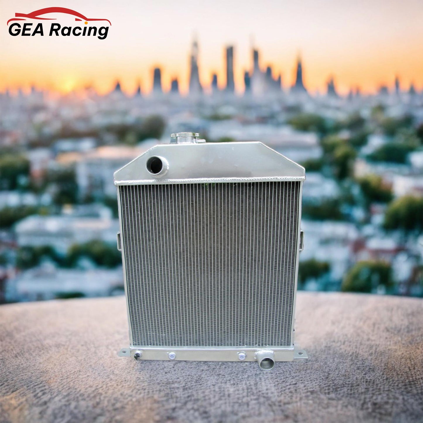 A 3-row performance aluminum radiator installed in a 1946 Ford Pickup engine bay with a Flathead V8 engine.