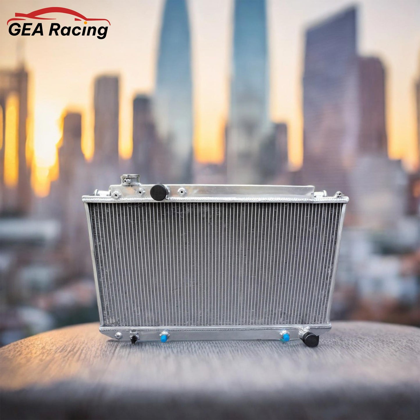 A performance aluminum radiator perfectly installed in a clean Toyota Cressida MX83 engine bay, demonstrating a direct fit and a significant aesthetic and functional upgrade.