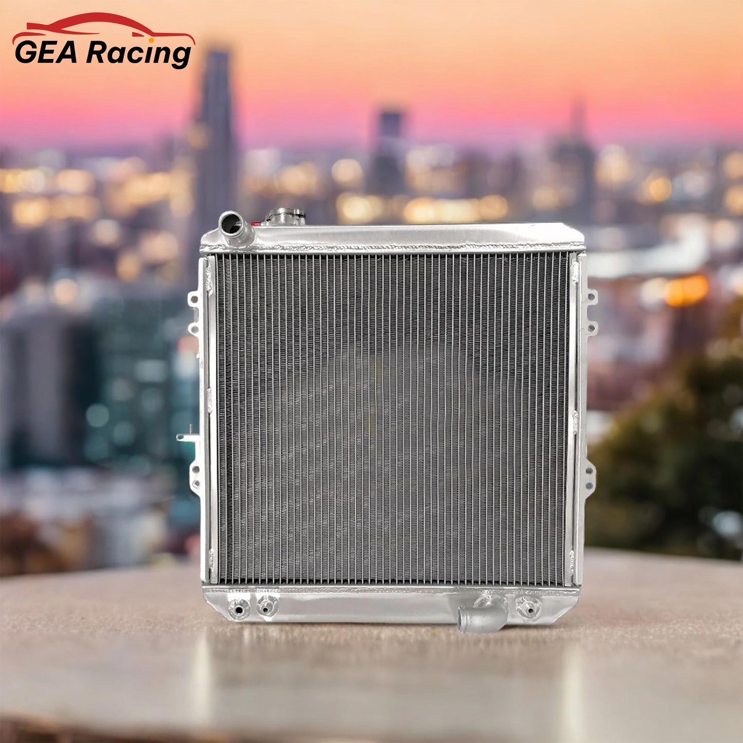 A performance aluminum radiator installed in a Toyota Hilux with a 3L diesel engine, a vital upgrade for work or off-roading.