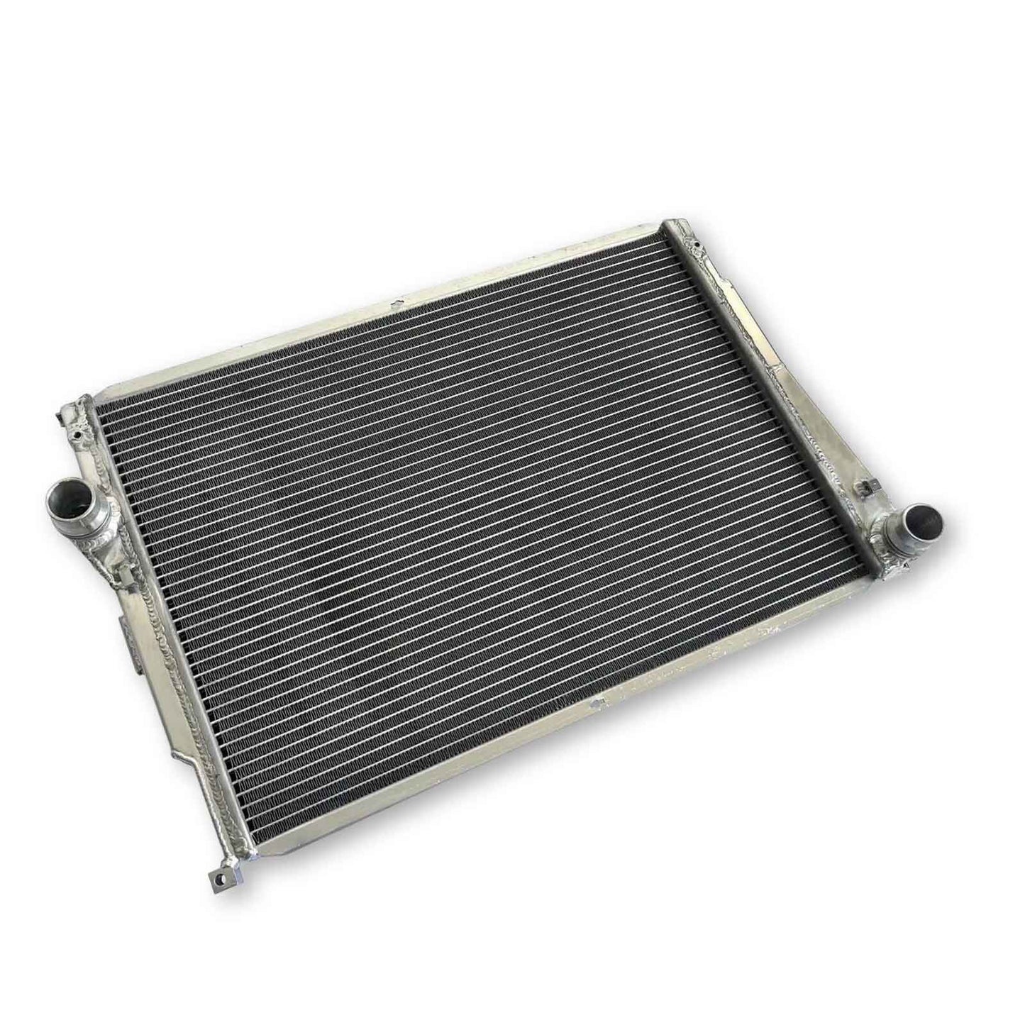 Left side profile of the heavy-duty 3-row aluminum radiator designed for maximum cooling on the manual BMW E46 M3 with the S54B32 engine.