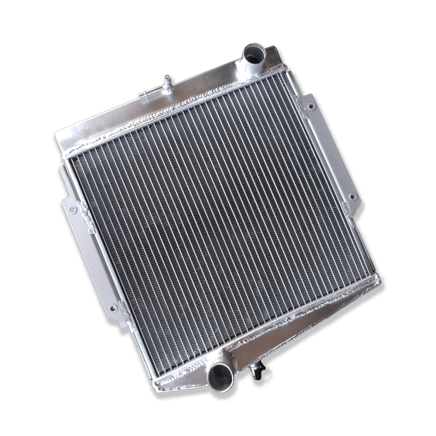 Left side profile of the all-aluminum radiator for the classic Datsun Fairlady Roadster, highlighting the robust TIG-welded tank construction.