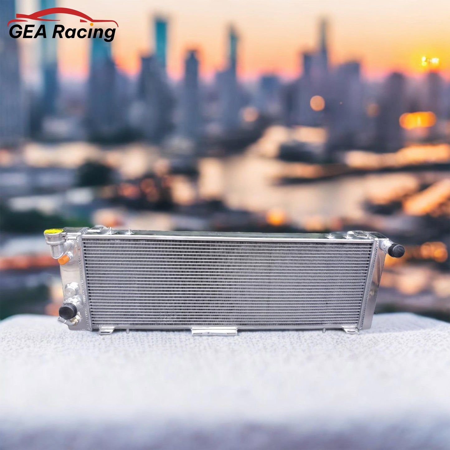 Left side profile of the all-aluminum radiator for the Jeep Cherokee XJ 4.0L, highlighting the robust TIG-welded tank construction for off-road use.