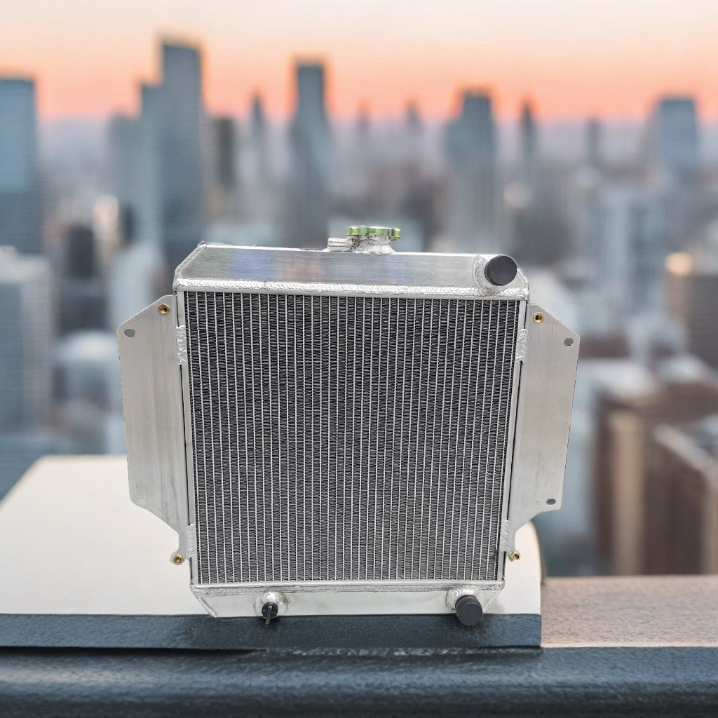 Left side profile of the all-aluminum radiator kit for the Suzuki Samurai, highlighting the TIG-welded tanks for off-road durability.