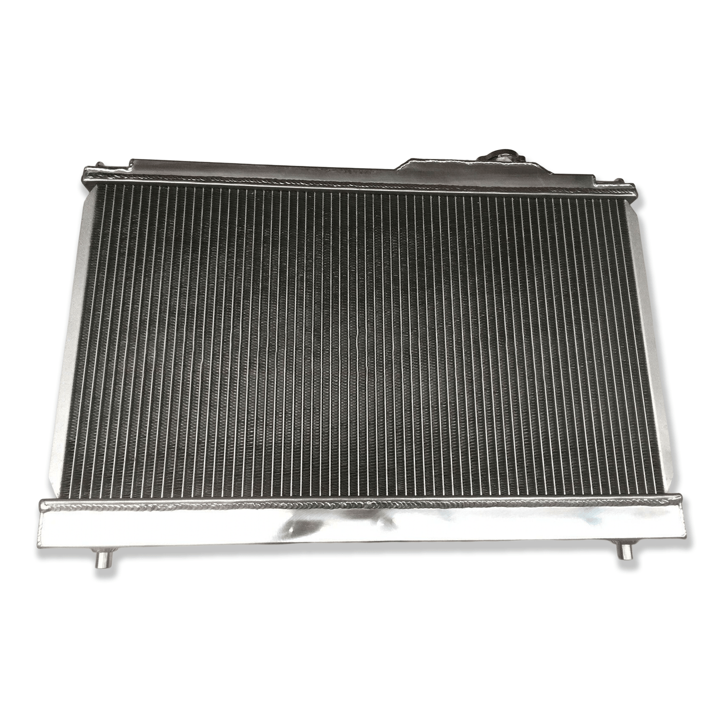 Rear view of the aluminum radiator for the Celica ST205 GT-Four, showing the direct-fit mounting points for manual transmission models.