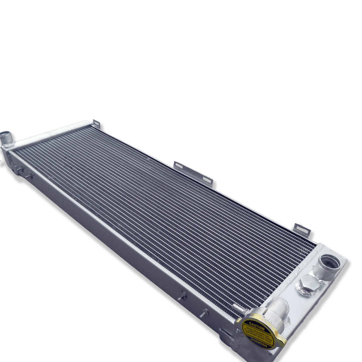 Top-down view of the 3-row radiator for the Jeep XJ 4.0L, displaying the high-pressure cap and triple-core design.