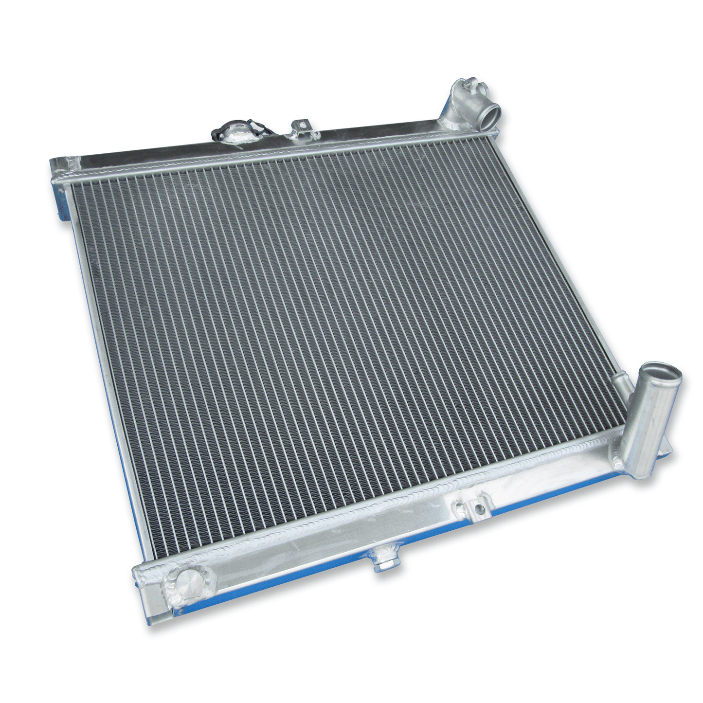 Top-down view of the 3-row radiator for the 1986-88 Mazda RX-7 FC, displaying the high-pressure cap and triple-core design.