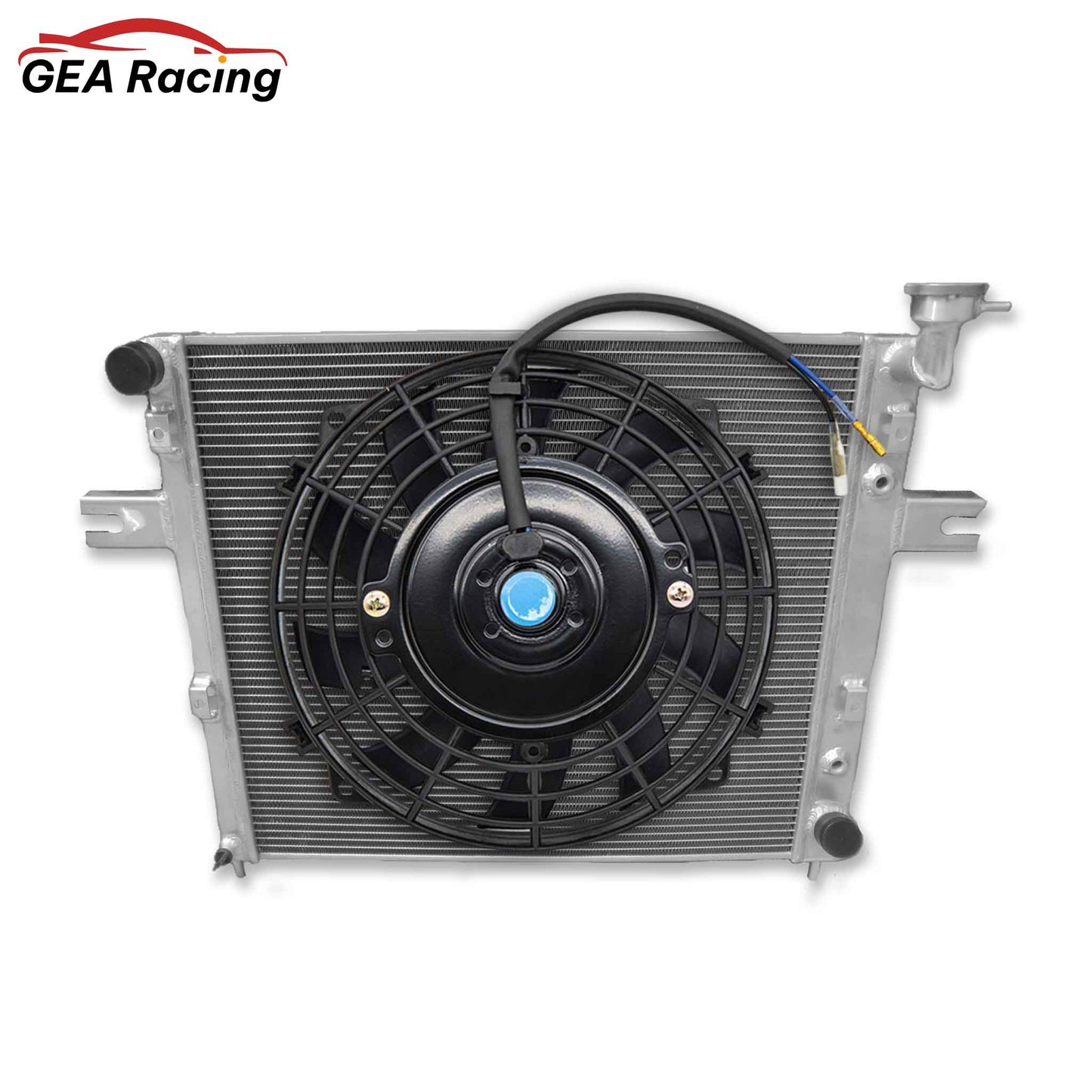 Top-down view of the 1999-2000 Jeep Grand Cherokee WJ/WG radiator, displaying the high-pressure radiator cap, filler neck, and upper mounting brackets.