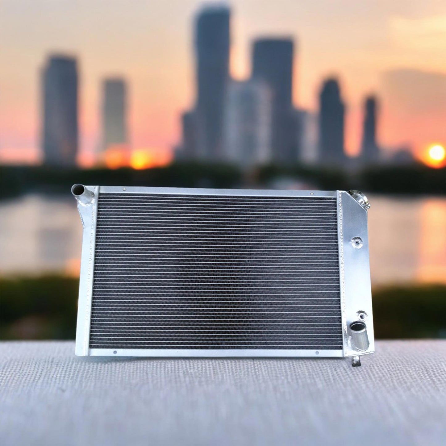 A 3-row aluminum radiator installed in the engine bay of a classic 1978 Chevy Corvette C3, ensuring its V8 stays cool.