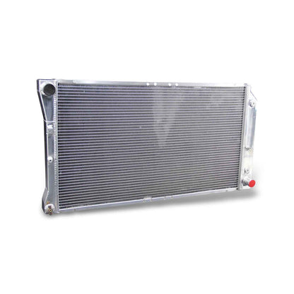 Left side profile of the aluminum radiator for the 1994-1996 5.7L V8 Buick Roadmaster, highlighting the inlet/outlet hose connections and side panel construction.