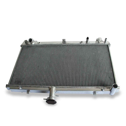 Top-down view of the 2-Row aluminum radiator for the 2012-2015 Chevrolet Camaro, highlighting the high-efficiency core and brackets.