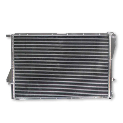 Rear view of the high-performance 2-row aluminum radiator for the BMW E39, E38, and Z8 models, showing precision mounting points and connections.