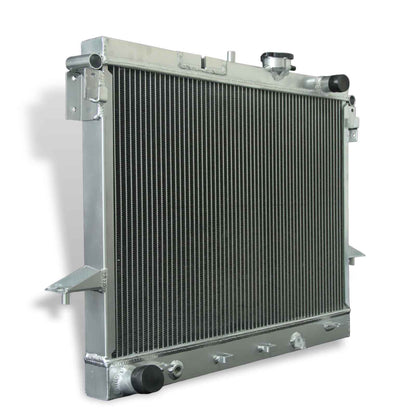 Left side profile of the 2-row aluminum radiator for the 2006-2012 Chevy Colorado V8, displaying the driver-side end tank and connections.