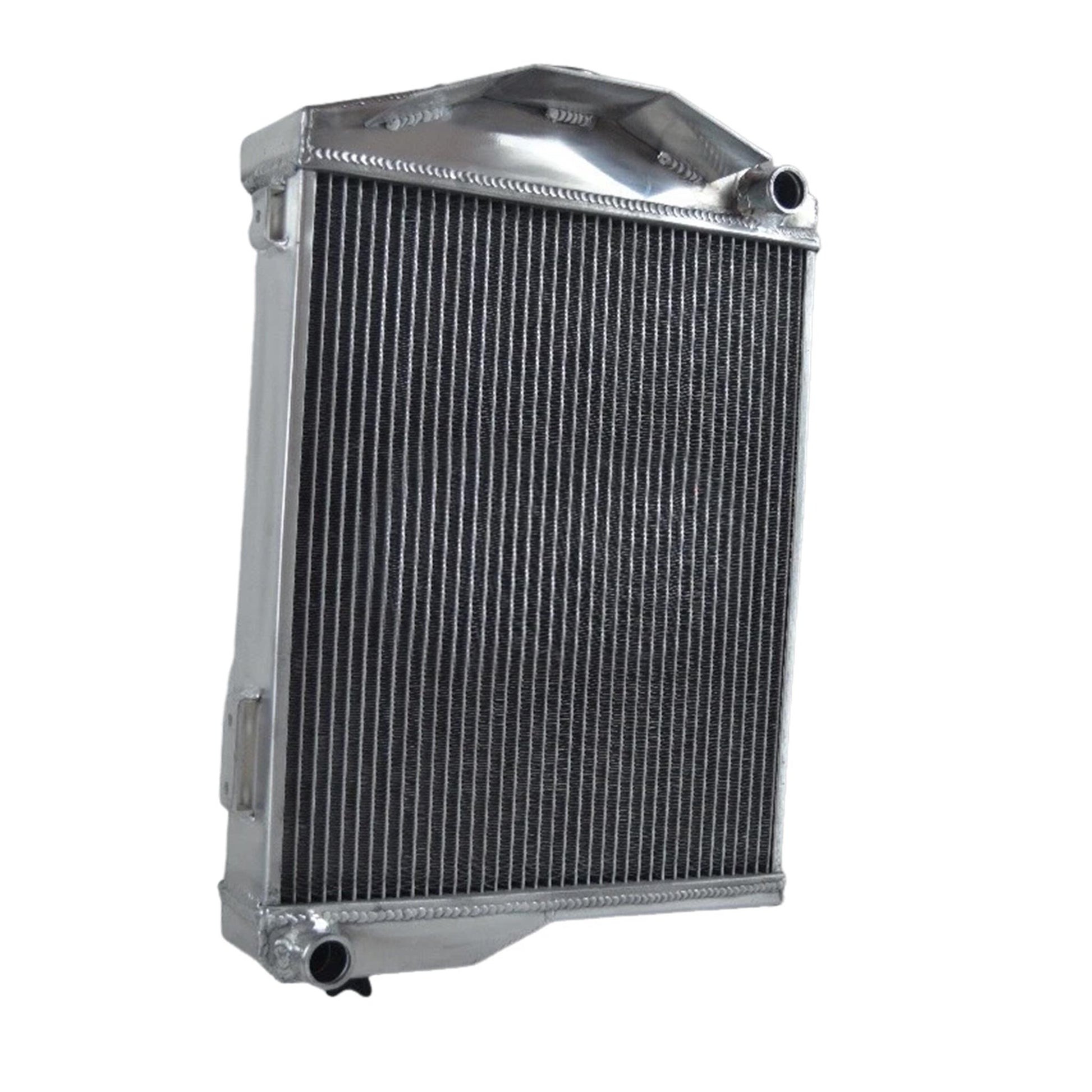 Right side profile of the aluminum radiator for a classic Austin-Healey, showing the polished finish and inlet/outlet port design.