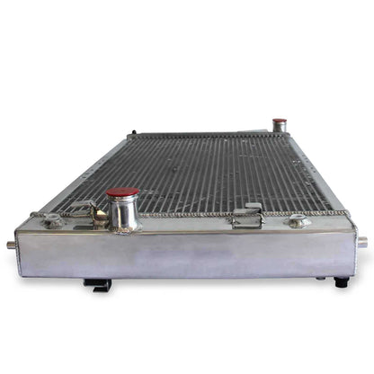 Detailed close-up of the TIG-welded seams and high-efficiency cooling fins on the 3 Row Aluminum Radiator for a Chevrolet Cavalier.