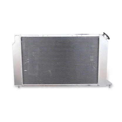 Rear view of the 3 Row Aluminum Radiator for Chevy S10/GMC Sonoma/Isuzu Hombre, highlighting the integrated automatic transmission cooler ports for AT/MT.