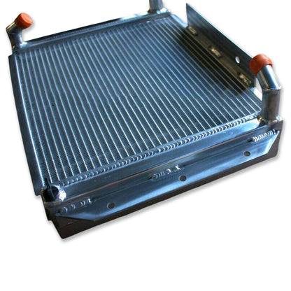 Left side profile of the high-performance aluminum radiator for MG MGA 1500-1622, highlighting the tank construction and filler neck.