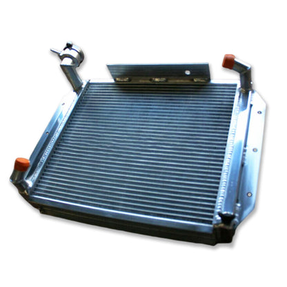Top-down view of the MG MGA DE LUXE aluminum radiator, featuring the 3-row core design and radiator cap fitting for models from 1955 to 1962.