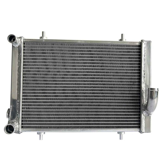 Front view of the 4 Row Aluminum Radiator designed for a 1979-1980 Triumph Spitfire 1.5L L4 with manual transmission (MT).