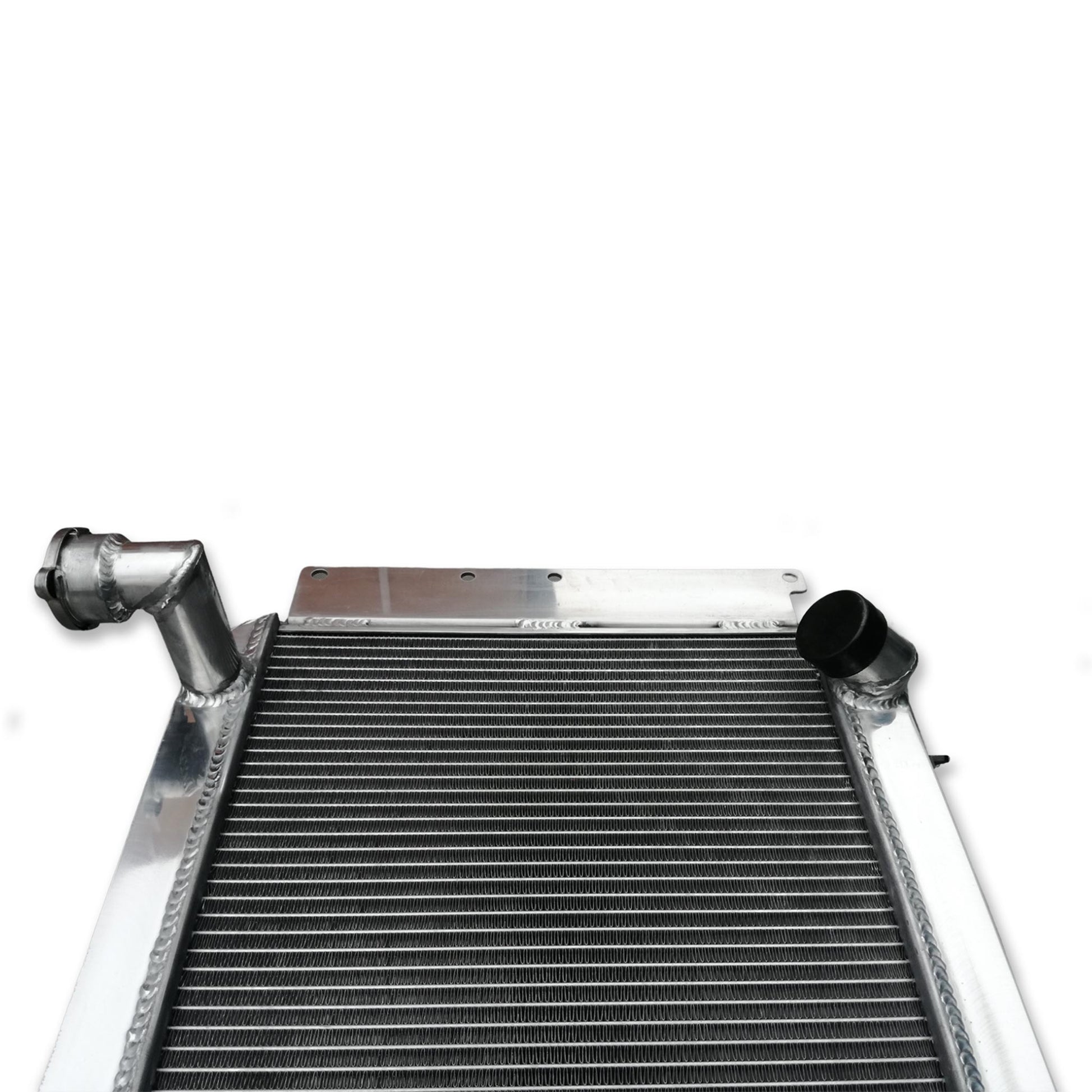 Detailed close-up of the furnace-brazed 5-row core and TIG welds on the 700HP radiator for a C1 Corvette.