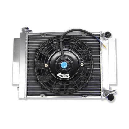 Complete aluminum radiator and fan shroud kit for Mazda RX2, RX3, RX4, including dual high-performance electric fans for maximum, consistent airflow and superior rotary engine cooling.