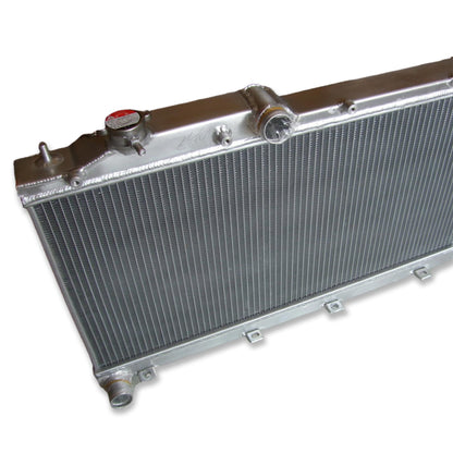 Detailed close-up of the TIG welds and high-efficiency 2-row core of the radiator for a 08-14 Subaru WRX STI.
