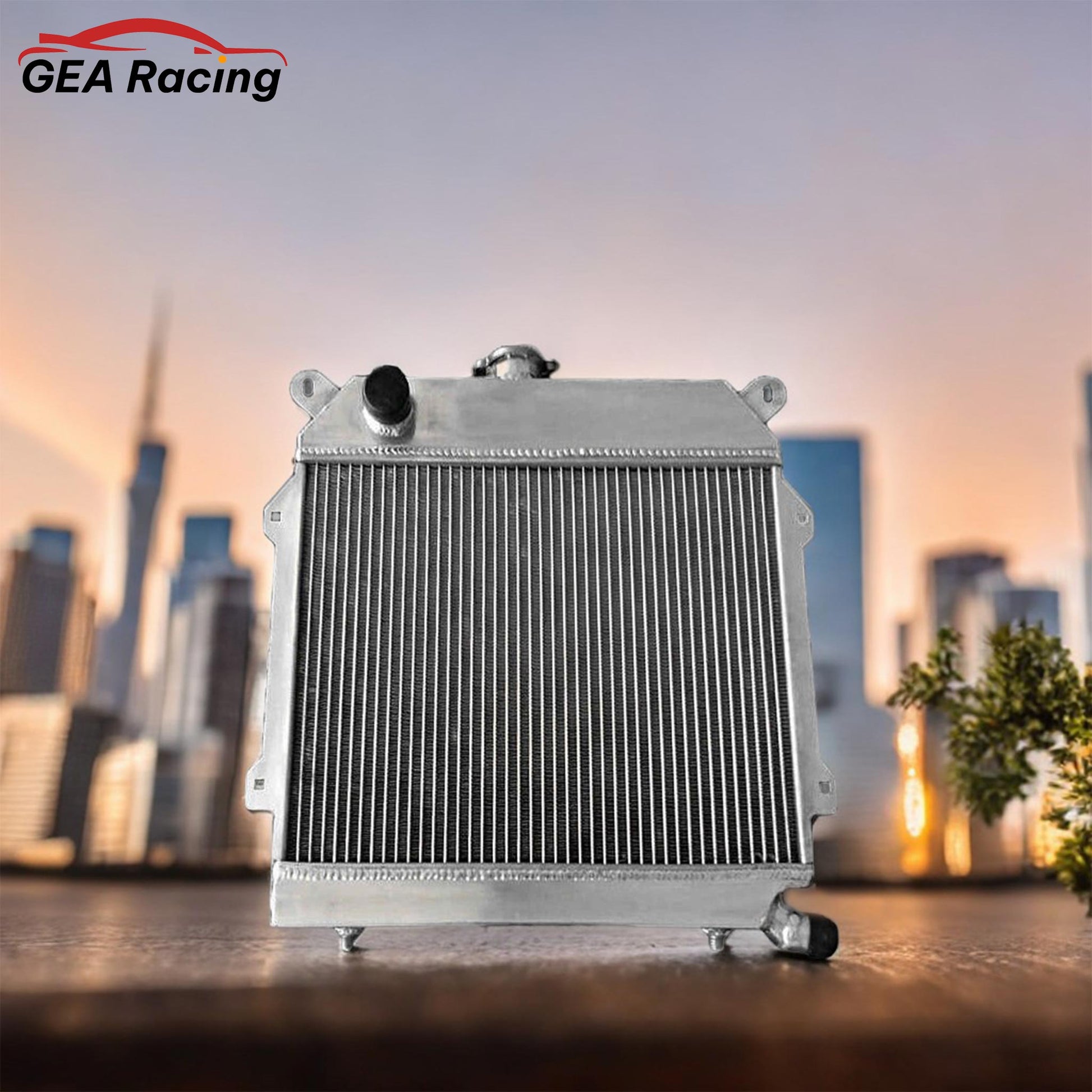 3-row aluminum radiator for BMW E21 320i shown with a compatible high-performance electric fan and shroud kit.