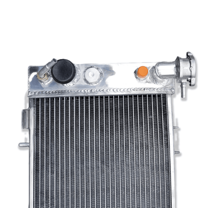 Close-up detail of the precision TIG welds on the 3-row aluminum radiator, built for the durability demanded by Jeep off-roading.
