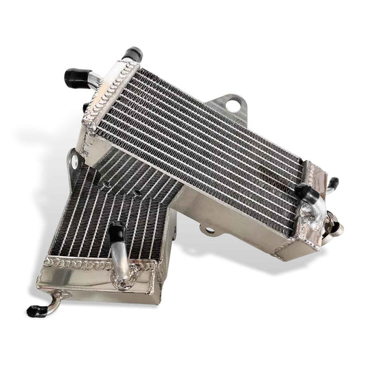 Close-up of high-density fins and brazed joints on Honda CR125R (1990–1997) aluminum radiator | GEA Racing