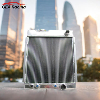 A 3-row performance aluminum radiator installed in a classic 1965 Ford Mustang V8 engine bay, a crucial cooling upgrade for any restoration.