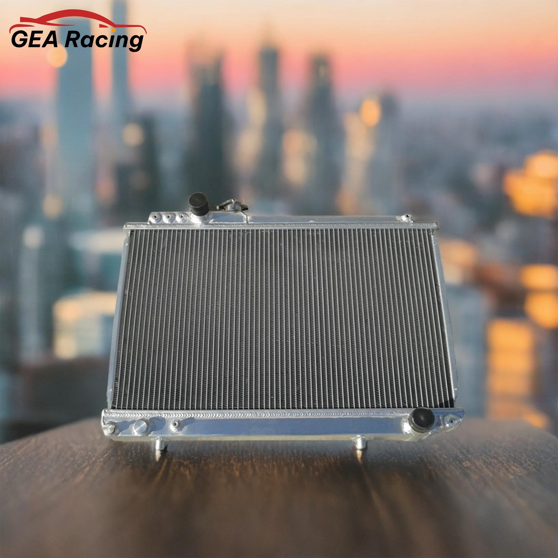 A 3-row performance aluminum radiator installed in a clean Toyota Supra MK3 7M-GTE engine bay, illustrating a perfect fit and a critical cooling system upgrade.