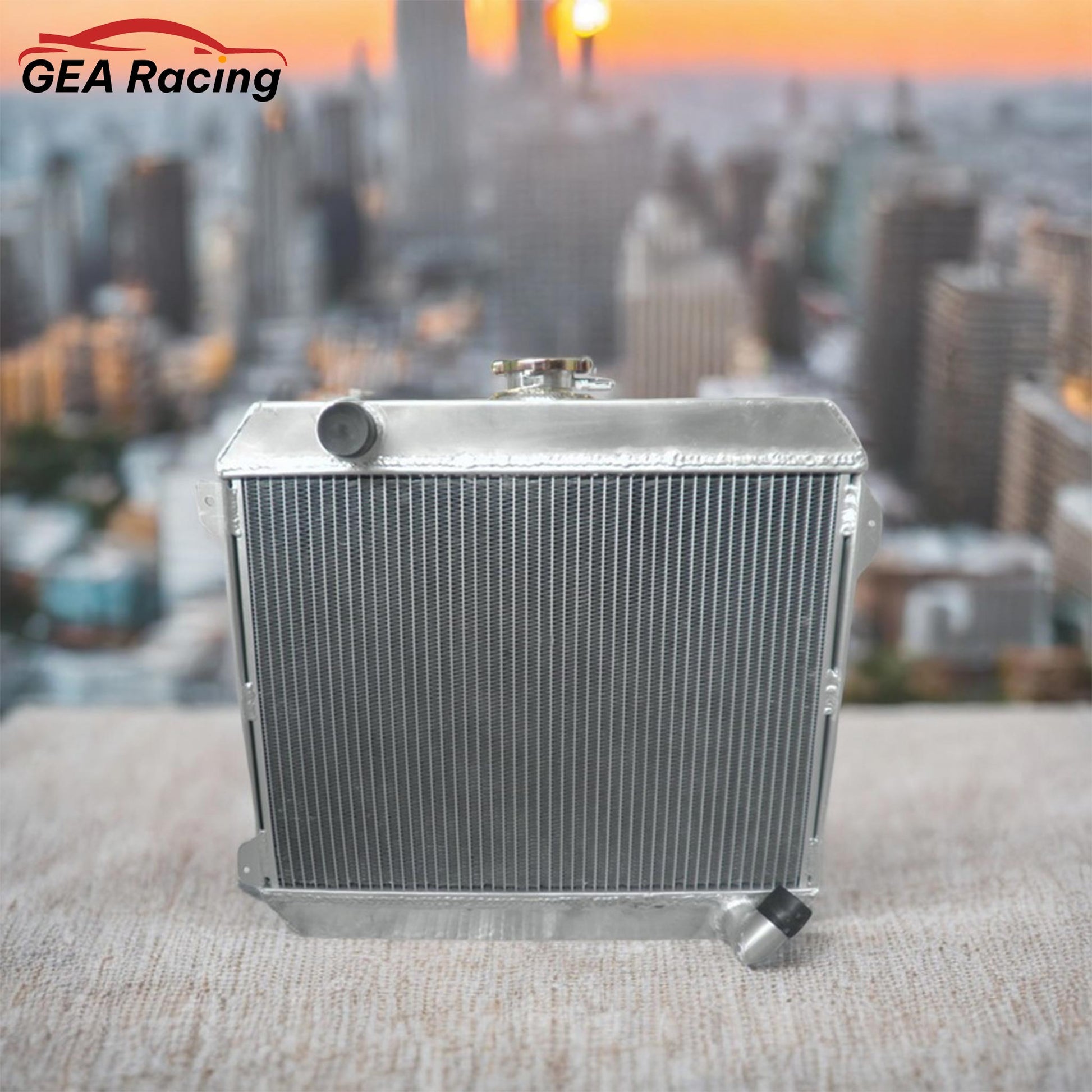 A performance aluminum radiator installed in a clean Datsun 620 pickup truck with an L20B engine, a vital cooling upgrade.