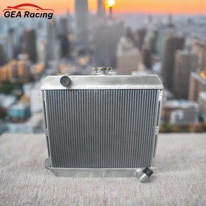 A performance aluminum radiator installed in a clean Datsun 620 pickup truck with an L20B engine, a vital cooling upgrade.