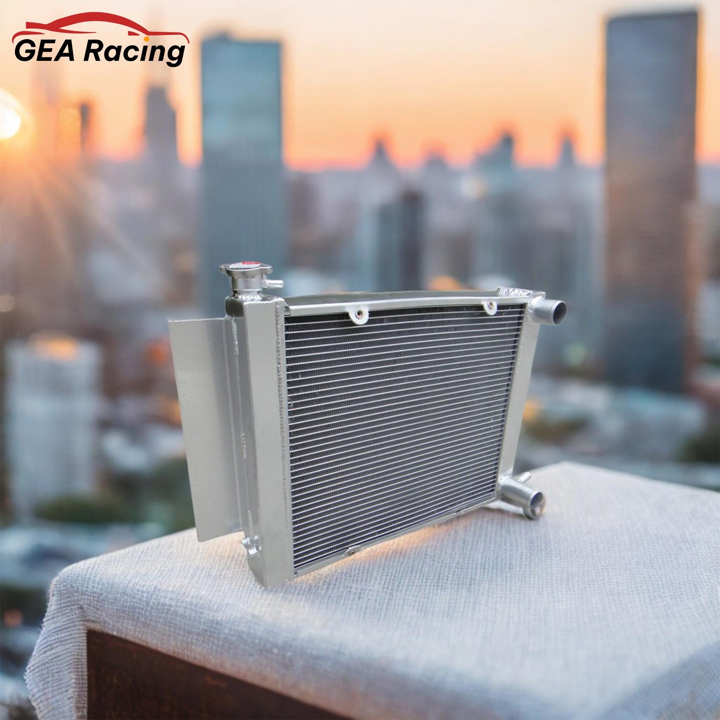 A clean installation of the performance aluminum radiator in a classic Mazda RX3 engine bay, showing a perfect fit and essential cooling upgrade for the rotary engine.
