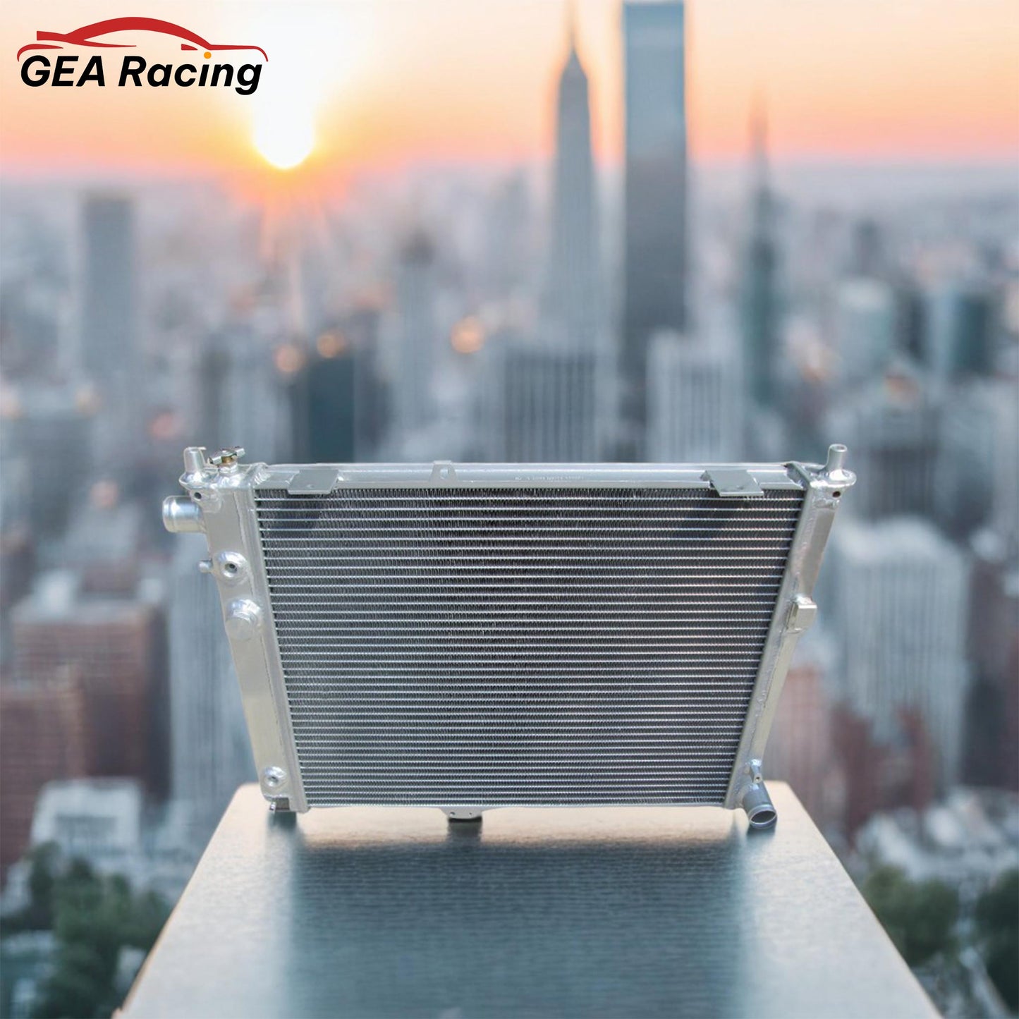 A performance aluminum radiator installed in a clean SAAB 9000 2.3L Turbo engine bay, demonstrating a perfect fit and essential cooling upgrade.