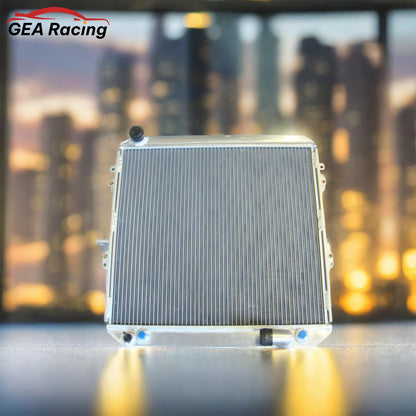 A performance aluminum radiator installed in a Toyota Hilux Surf LN130 engine bay, a vital upgrade for off-roading or daily driving.