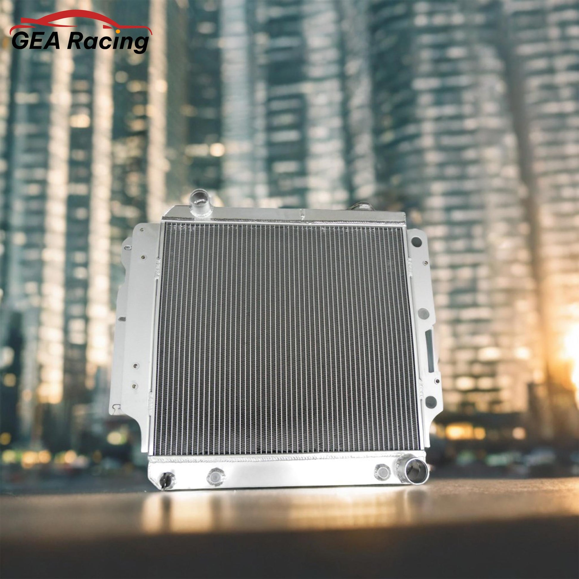 A 3-row performance aluminum radiator installed in a Jeep Wrangler TJ with a Chevy V8 engine swap, showing a clean fit.