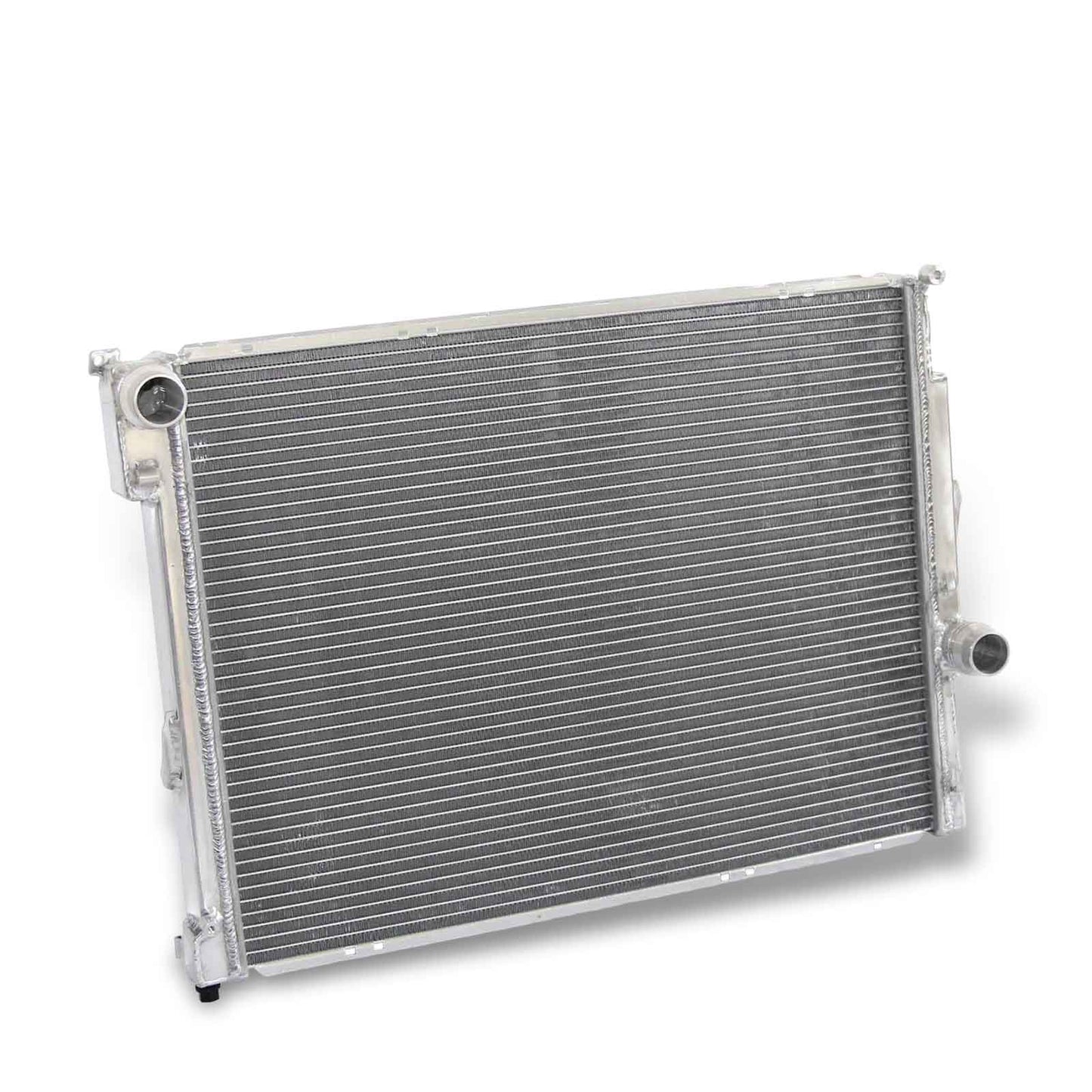 Left side profile of the heavy-duty 2-row aluminum radiator designed for enhanced cooling on the manual BMW E46 325i, 330i, and Z4.