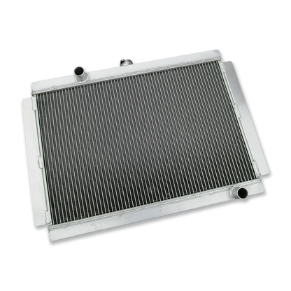 Left side profile of the performance aluminum radiator for Nissan 280ZX S130 and 280Z S30 models, highlighting the robust, fully welded end tank and coolant inlet port.