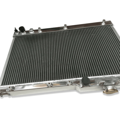 Left side profile of the all-aluminum radiator for the Celica GT-Four ST205, highlighting the robust TIG-welded end tanks for high-boost applications.