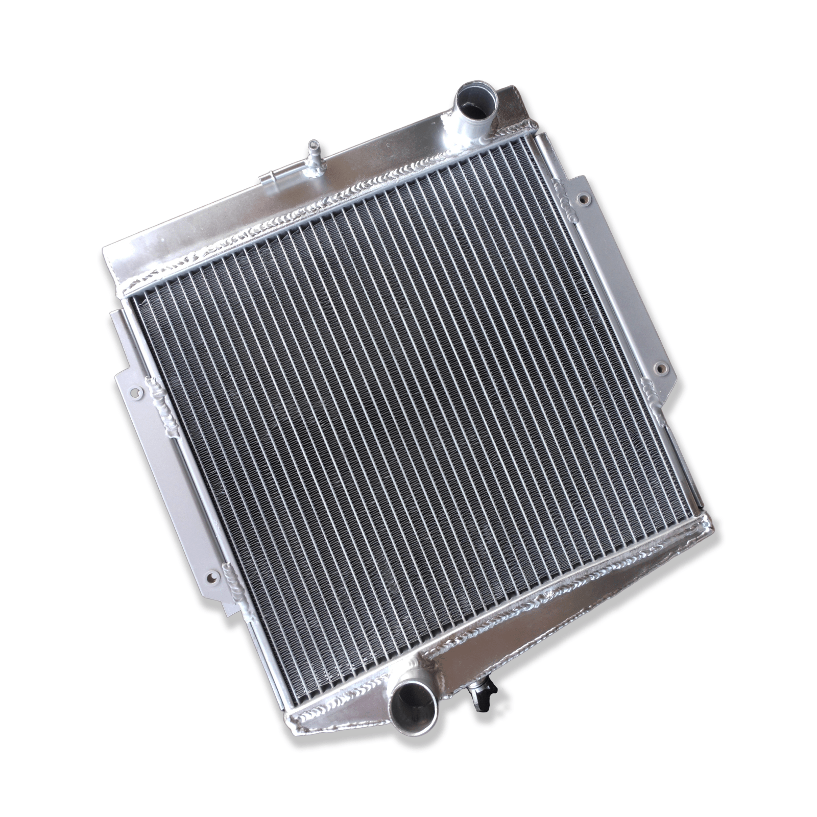 Left side profile of the all-aluminum radiator for the classic Datsun Fairlady Roadster, highlighting the robust TIG-welded tank construction.