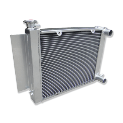 Left side profile of the TIG-welded aluminum radiator for the Mazda RX3 and RX4, highlighting the robust end tank construction and coolant inlet/outlet ports.
