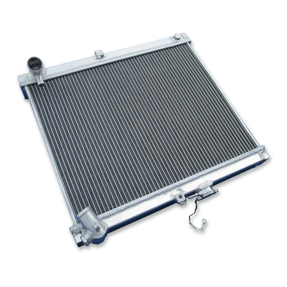 Left side profile of the all-aluminum radiator for the FC RX-7 rotary engine, highlighting the robust TIG-welded end tanks.