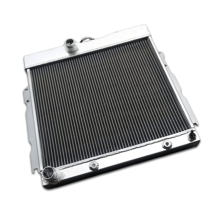 Left side profile of the all-aluminum radiator for classic Mopar V8 cars, highlighting the robust TIG-welded tank construction.