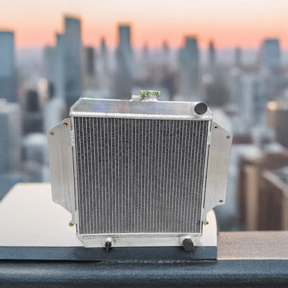 Left side profile of the all-aluminum radiator kit for the Suzuki Samurai, highlighting the TIG-welded tanks for off-road durability.
